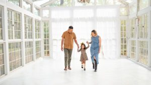 Motherhood portrait inside The Oak Atelier glasshouse in The Woodlands